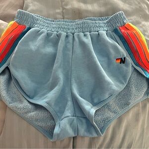Blue Athletic Shorts with Rainbow Stripes
